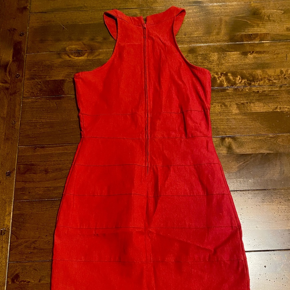 Red body on dress with horizontal ribbing.